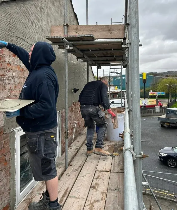 Commercial rendering team on scaffold in Preston